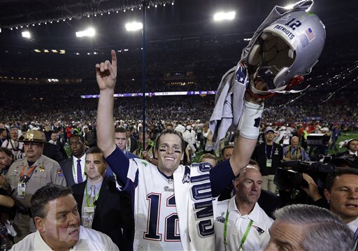 New England Patriots quarterback Tom Brady (12) celebrates after the NFL Super Bowl XLIX football game against the Seattle Seahawks Sunday, Feb. 1, 2015, in Glendale, Ariz. The Patriots won 28-24. (AP Photo/David J. Phillip)