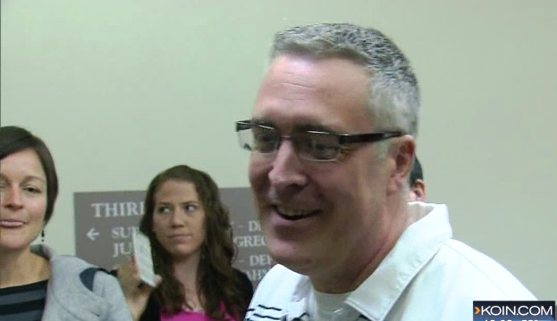 Allen Bricker (striped shirt) greets friends outside the courtroom where the woman who shot him, Deborah Lennon, was sentenced, March 13, 2015 (KOIN 6 News)