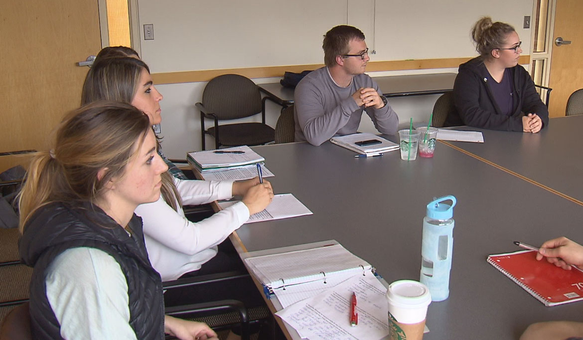 Students discuss the results of the crime mapping system. (KOIN 6 News)