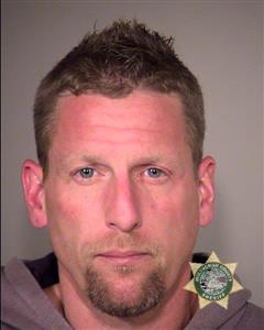 Aden Donald Thomas, 45, shown in a jail booking photo (MCSO).