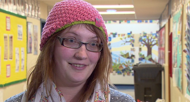 Chivara Fisher, a friend of Sami Smith, stands inside Bilquist Elementary in Milwaukie, Dec. 18, 2015 (KOIN)