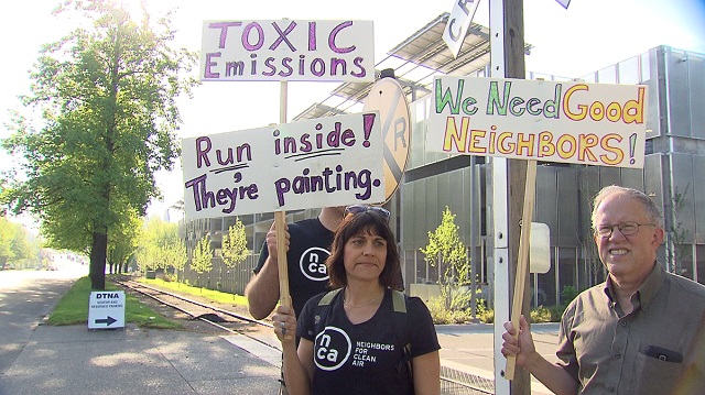 This is an image of protesters in front of Daimler headquarters.