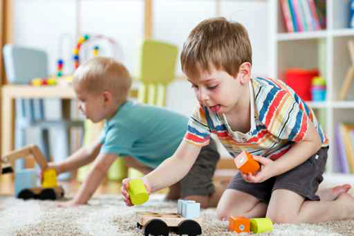 Children playing with toys in kindergarten or daycare or home_294806