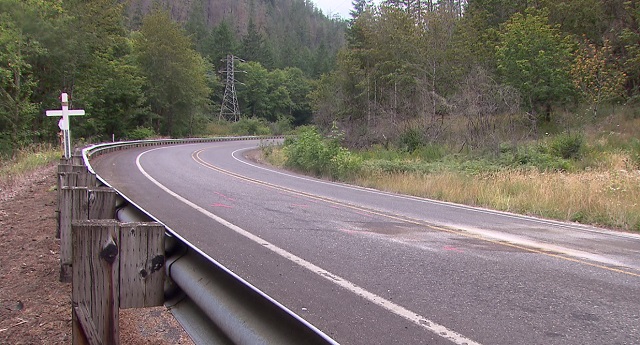 A memorial is placed along Hwy 224 near Estacada where an 8-year-old boy died in a crash, July 19, 2016 (KOIN)