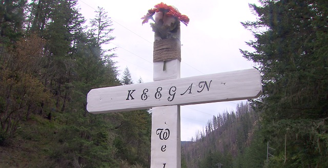 A memorial is placed along Hwy 224 near Estacada where an 8-year-old boy died in a crash, July 19, 2016 (KOIN)