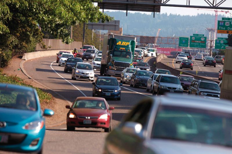 A recent ODOT report attributed hours of delays to I-5 bottlenecks, but critics say new lanes draw new traffic. generic congestion portland fre_513872