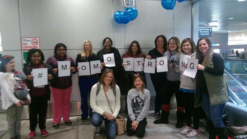 Michelle O'Malley and her daughter Ashley were greeted by friends at PDX, November 22, 2017 (Courtesy: Cassandra Deering)