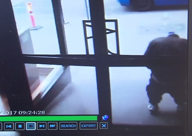 Surveillance video from Judith Arnell Jewelers on SW Broadway shows a man defecating right outside the front door in broad daylight. (KOIN)