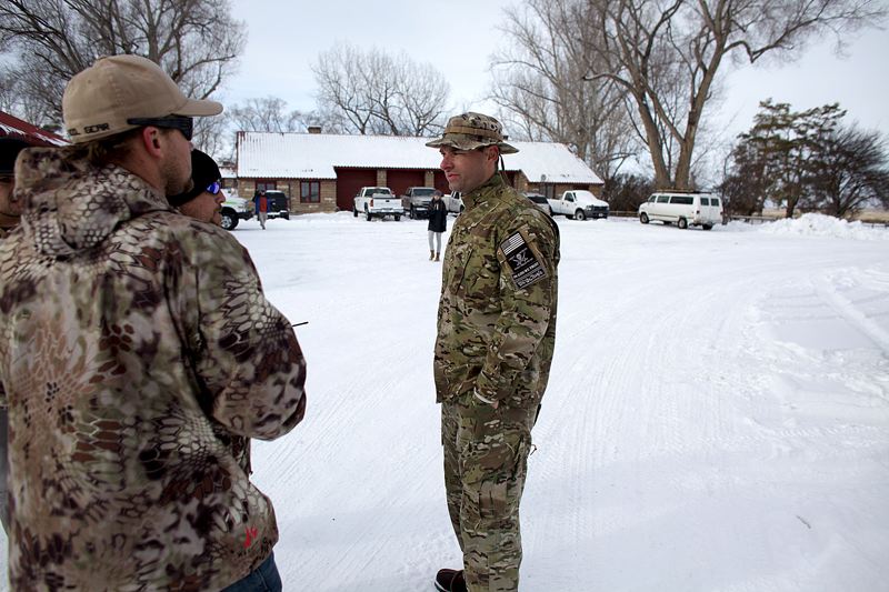 Blain Cooper, 36, and fellow protesters stand in the seized Malheur Nation Refuge complex about 30 miles from Burns. The group wants federal la_260873