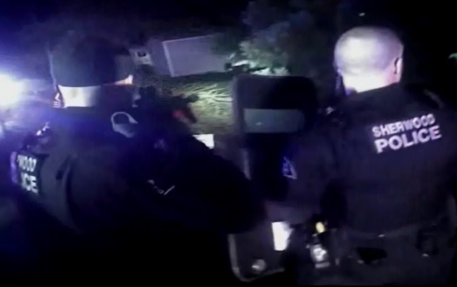 Sherwood Police Officers arrived at the scene where James Tylka shot Oregon State Police Trooper Nic Cederberg on December 25, 2016. (Body cam video still)