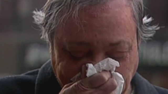 FILE: A man sneezes into a tissue. (KOIN)