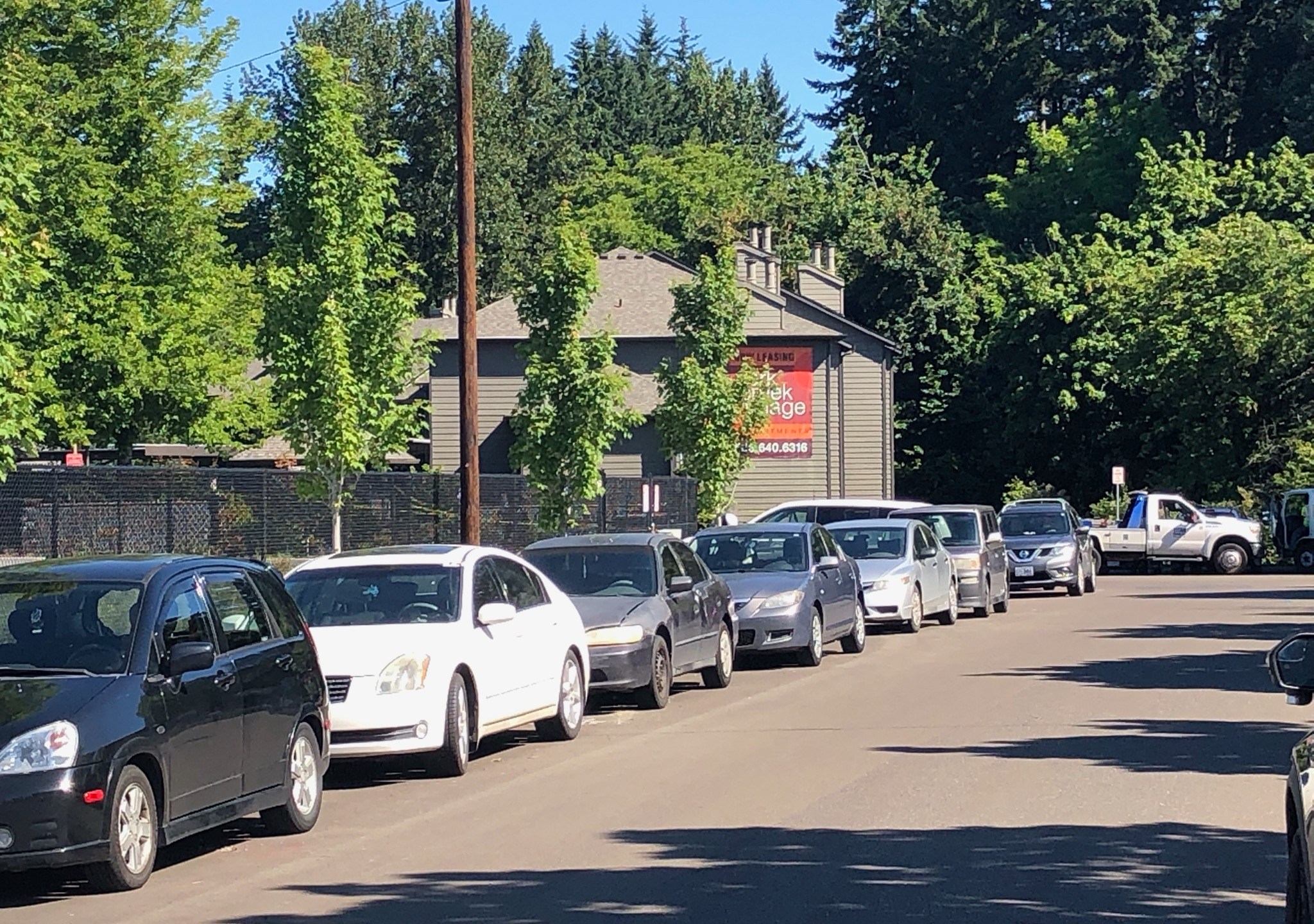 Officers at the scene of a shooting involving a tow truck driver and another individual in Hillsboro on June 17, 2021. (KOIN)