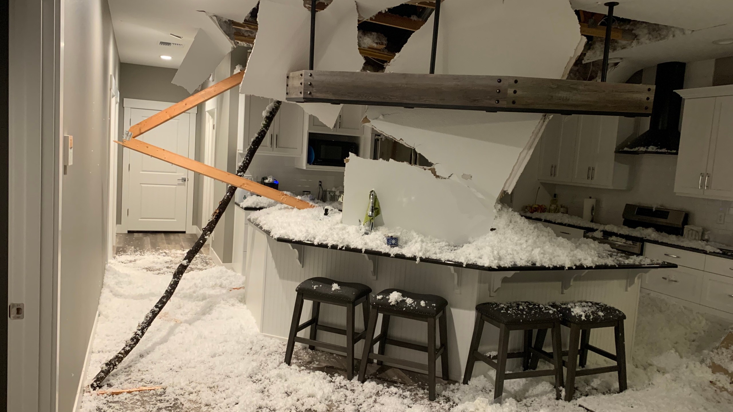 Home damage caused by fallen tree during winter ice storm, Feb. 12, 2021. (Courtesy Patty Hall)