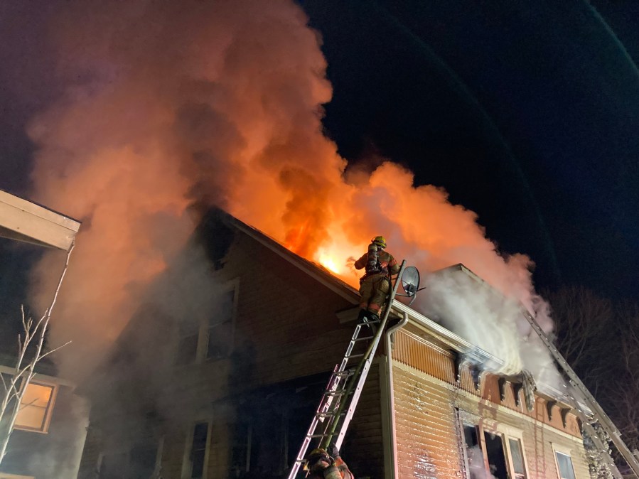 A woman was rushed to the hospital after a two-alarm blaze in North Portland early Thursday morning, Portland Fire & Rescue said.