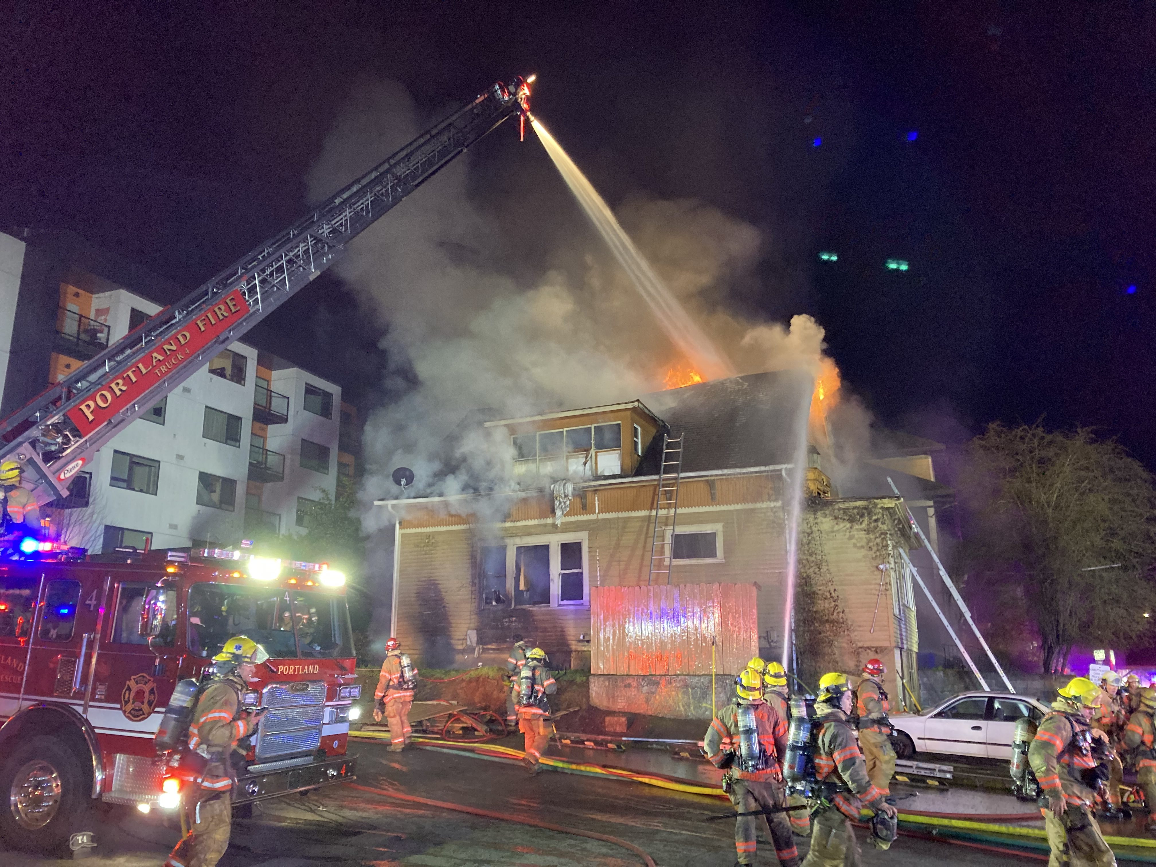 A woman was rushed to the hospital after a two-alarm blaze in North Portland early Thursday morning, Portland Fire & Rescue said.