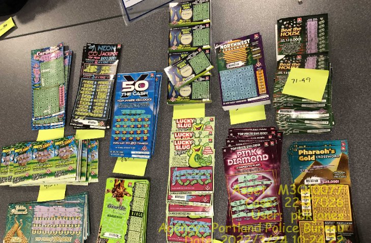 A trove of lottery tickets was recovered by police after they arrested a man connected to two burglary cases and a stolen car, the Portland Police Bureau said Thursday on Twitter.