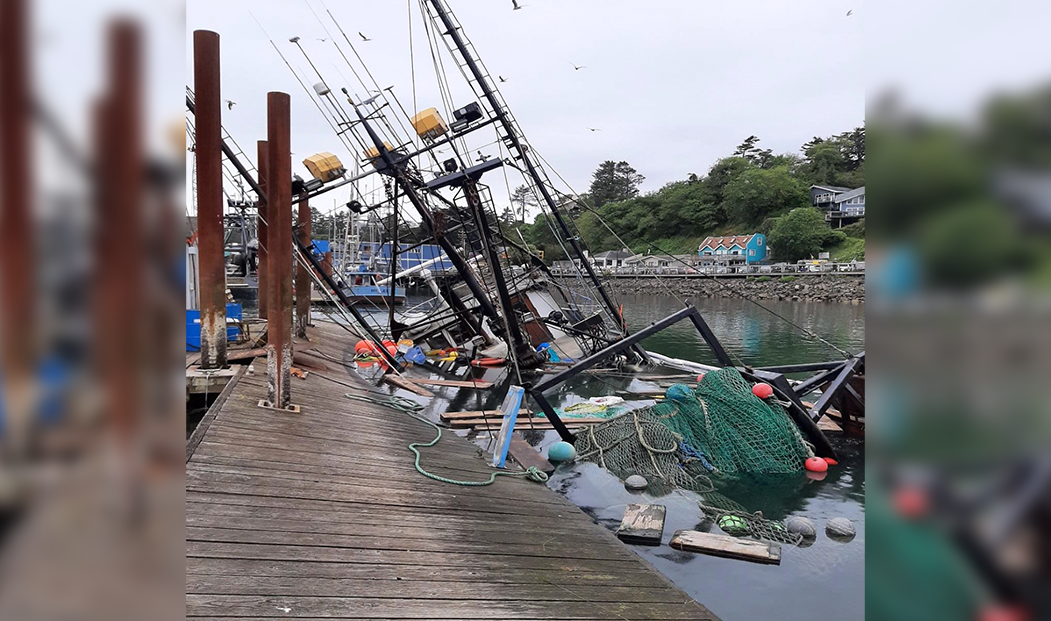 Fishing boat kept from sinking in Newport Bay