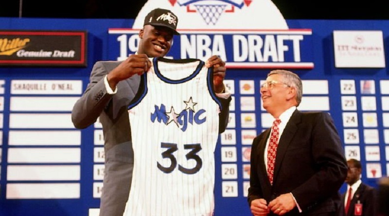 Shaquille O'Neal poses with the Orlando Magic uniform with NBA Commissioner David Stern after being selected number one overall by the Orlando Magic in the 1992 NBA Draft on June 24, 1992 in Portland, Oregon. (Photo by Nathaniel S. Butler/NBAE via Getty Images)