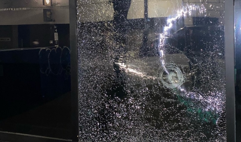 Dozens of protesters marched from Lownsdale Square through downtown Portland streets, smashing windows including these at Bank of America and SW 5th and Salmon, July 4, 2022 (KOIN)