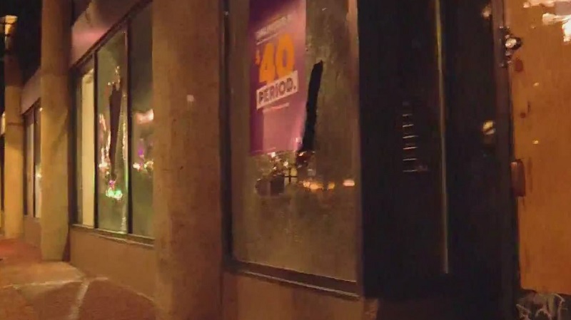 Dozens of protesters marched from Lownsdale Square through downtown Portland streets, smashing windows at numerous businesses, July 4, 2022 (KOIN)