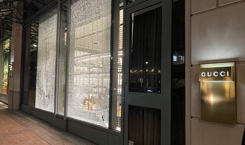 Dozens of protesters marched through the streets of downtown Portland and smashed windows at multiple businesses, July 4, 2022 (KOIN)