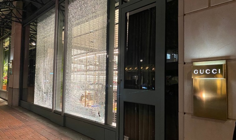 Dozens of protesters marched through the streets of downtown Portland and smashed windows at multiple businesses, July 4, 2022 (KOIN)