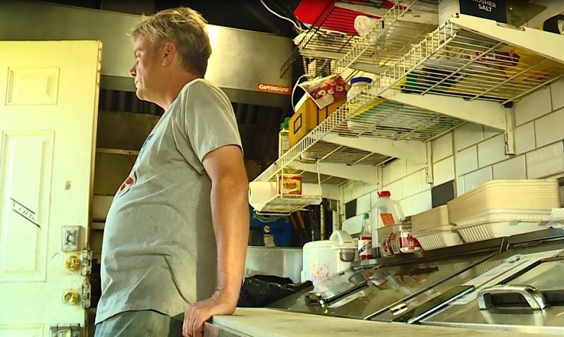 Owner John Nashlund stands inside Mo'jo's Hawaiian food cart in Southeast Portland, July 25, 2022 (KOIN)