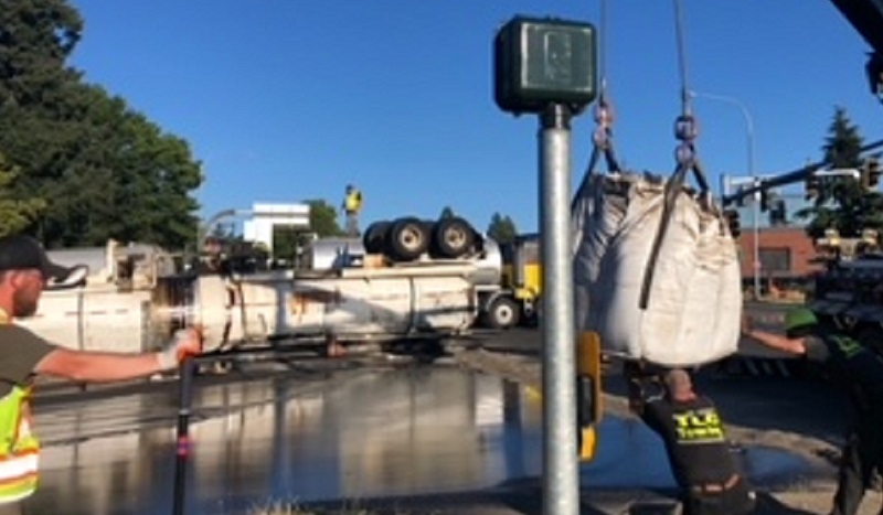 Hazmat crews rushed to I-5 north in Vancouver after a tanker truck flipped and spilled liquid, July 18, 2022 (VFD)