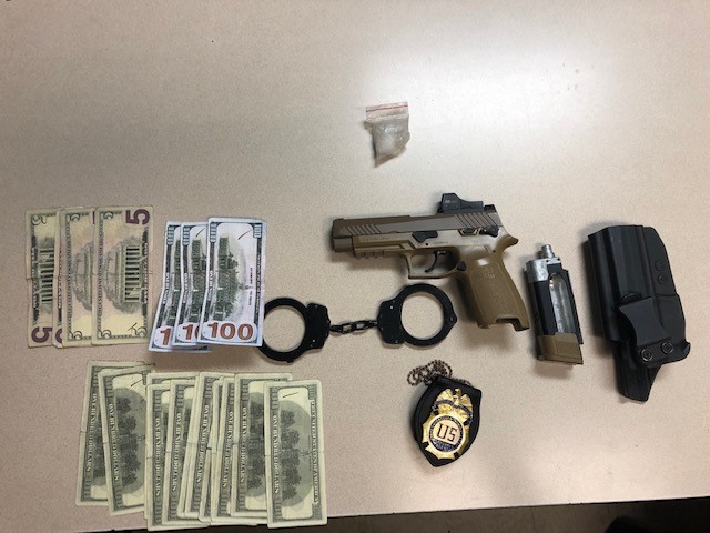 A counterfeit DEA badge, an airsoft gun and suspected drugs were among the items seized from a stolen pickup in SE Portland on Sunday, Aug. 14, 2022 