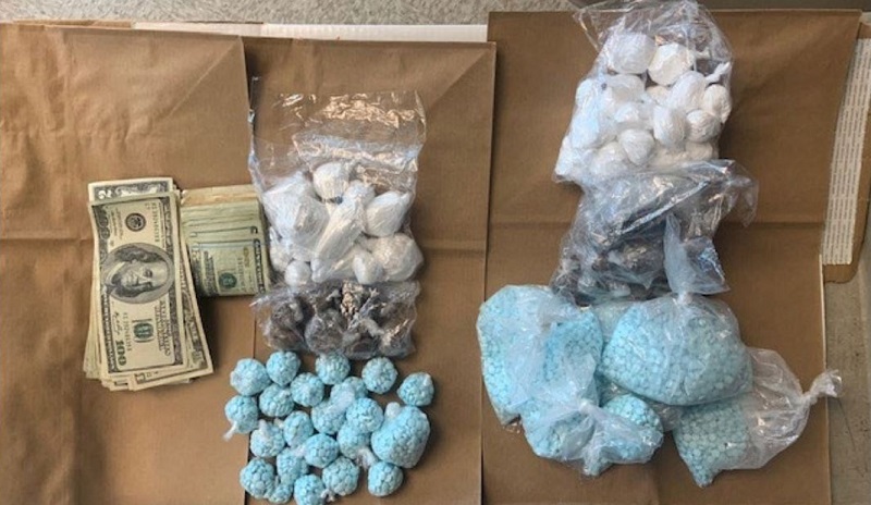 Fentanyl pills and cash, August 2022 (DEA)