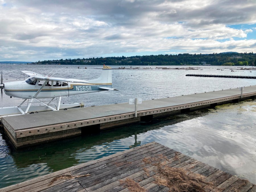 The home base for Northwest Seaplanes and Friday Harbor Seaplanes at the Renton Municipal Airport was quiet Monday, Sept. 5, 2022, as they awaited reports from the U.S. Coast Guard, which is searching the waters of Puget Sound northwest of Seattle after one of their floatplanes crashed on Sunday, Sept. 4, afternoon. One body was recovered and nine remained missing on Monday. (AP Photo/Martha Bellisle)