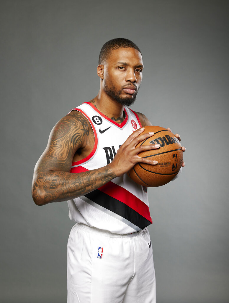 Portland Trail Blazers guard Damian Lillard poses for a portrait during the NBA basketball team's media day in Portland, Ore., Monday, Sept. 26, 2022. (AP Photo/Craig Mitchelldyer)