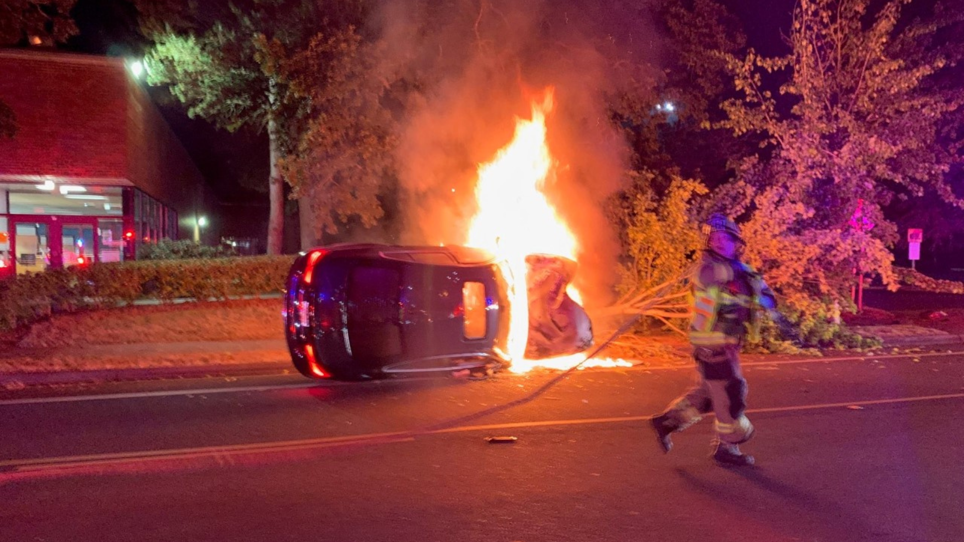 Beaverton police officer saves man trapped in burning car after roll-over crash