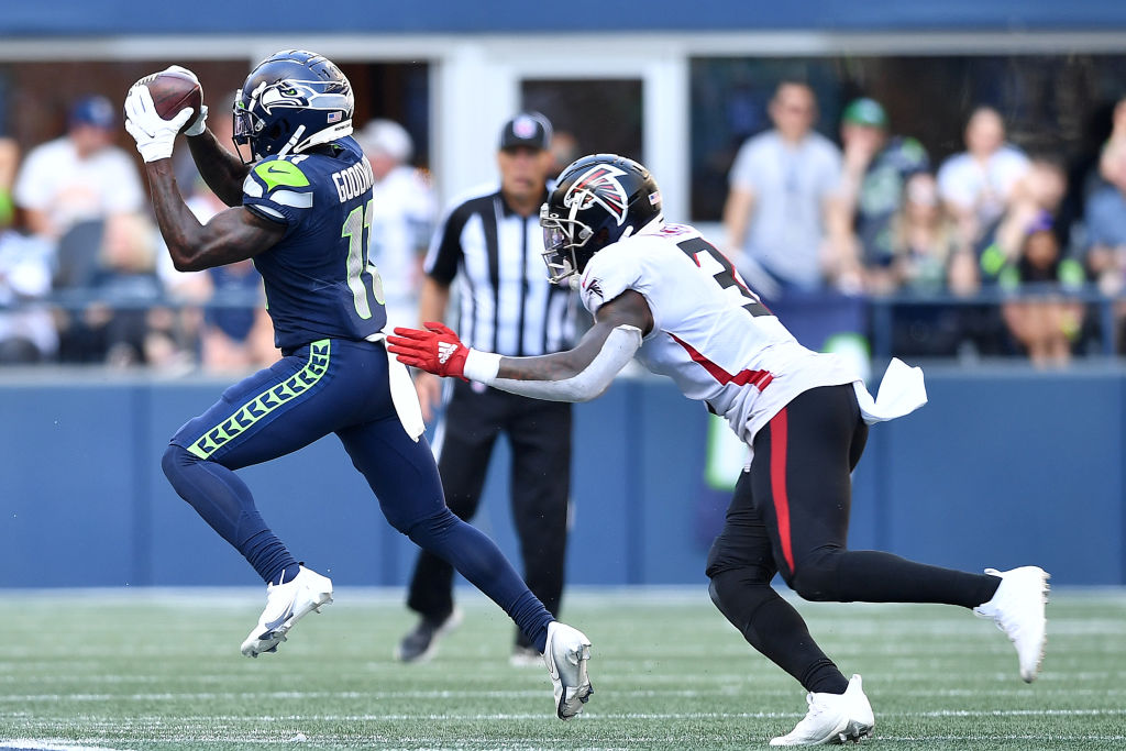 Marquise Goodwin #11 of the Seattle Seahawks makes a catch against Mykal Walker #3 of the Atlanta Falcons during the fourth quarter at Lumen Field on September 25, 2022 in Seattle, Washington. (Photo by Jane Gershovich/Getty Images)