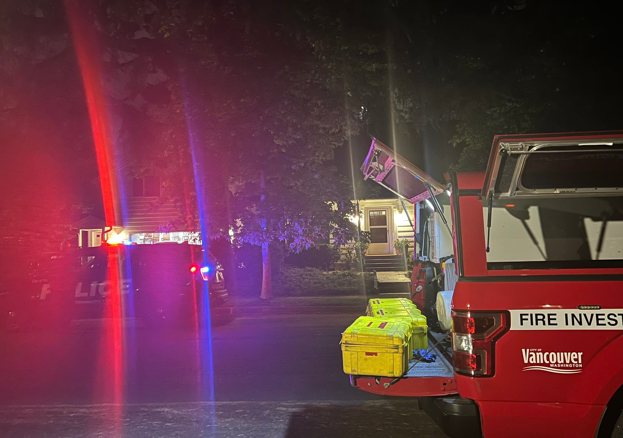 A Vancouver Fire investigation vehicle and a Vancouver police vehicle outside of the home of Mayor Anne McEnerny-Ogle on Monday, Sept. 12, 2022.