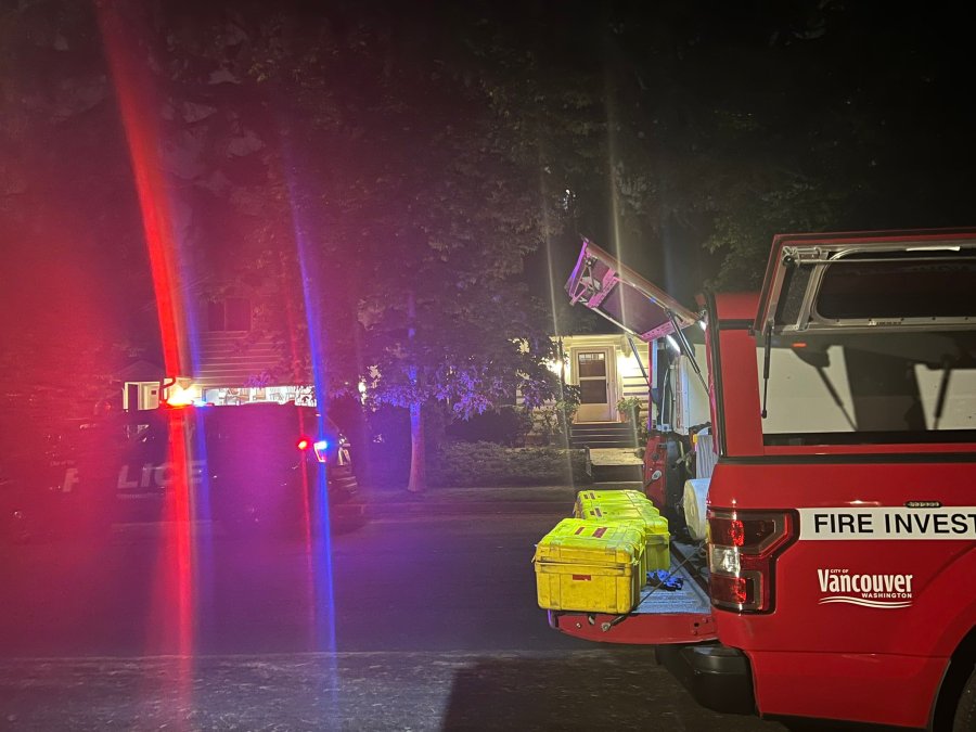 A Vancouver Fire investigation vehicle and a Vancouver police vehicle outside of the home of Mayor Anne McEnerny-Ogle on Monday, Sept. 12, 2022.