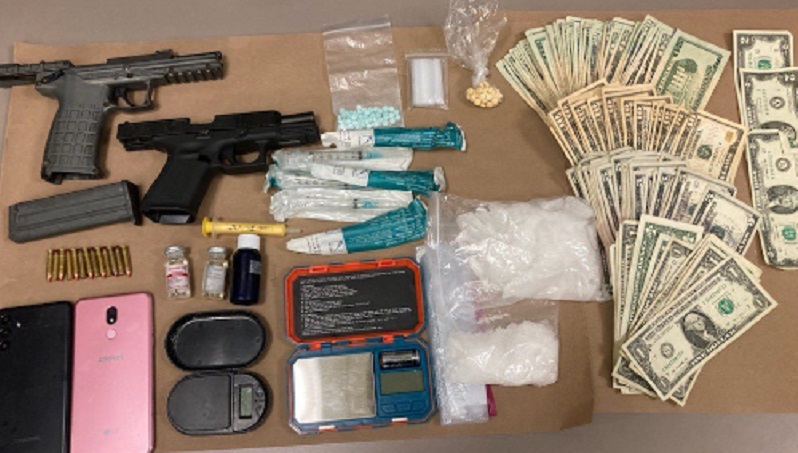 Guns, drugs and cash were seized during an arrest at NE 96th and Sandy in Portland, September 5, 2022 (PPB)