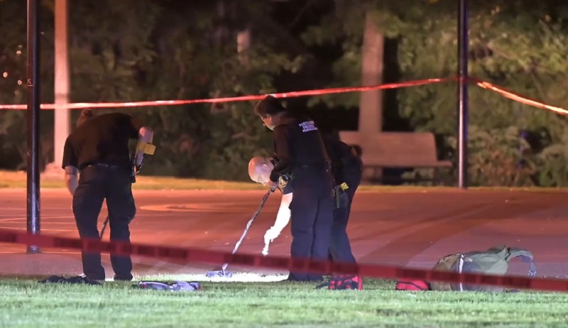 Police look for bullet casings after a woman was shot to death in Wallace Park near Chapman Elementary in Northwest Portland, September 24, 2022 (KOIN)