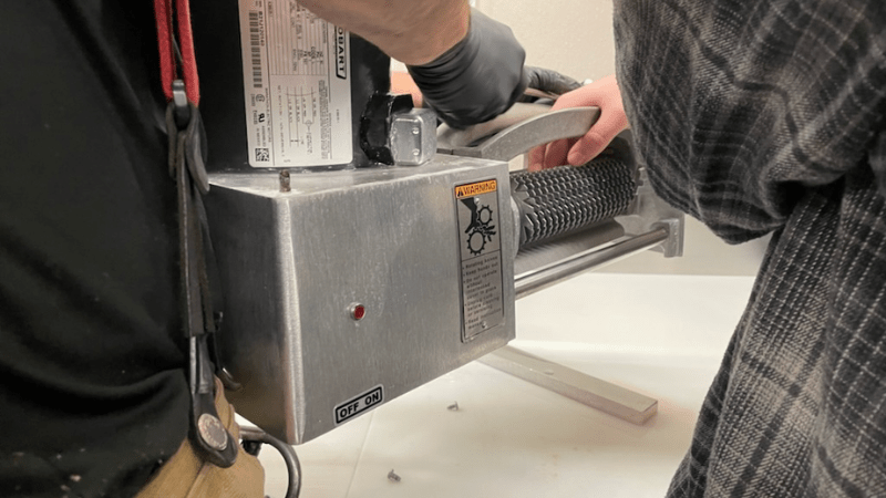 Officials: Portland, OR supermarket employee gets hand stuck in meat machine