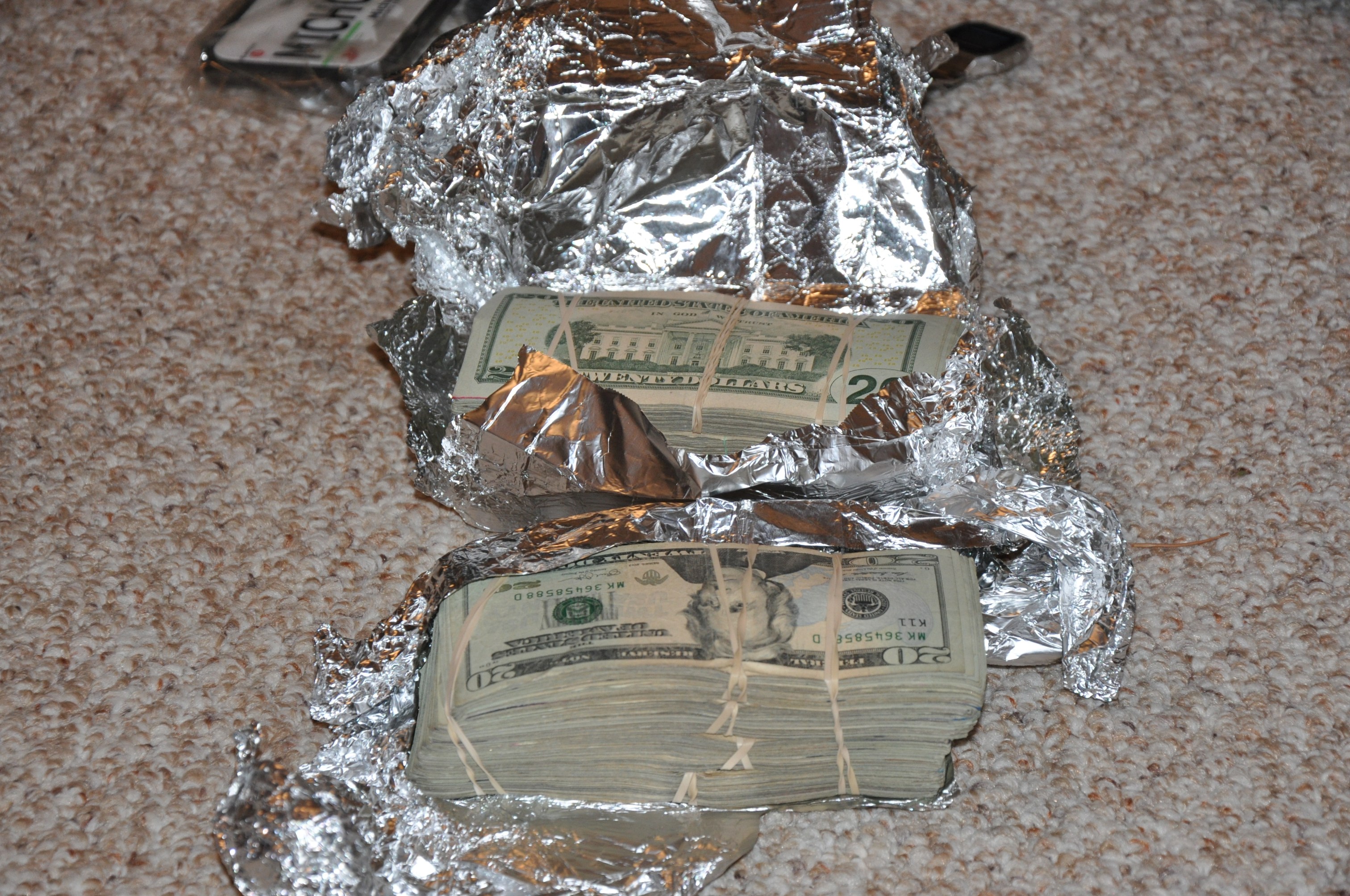 Cash recovered from an illegal marijuana grow bust at a Newberg, Oregon property. (Credit: Yamhill County Sheriff's Office)