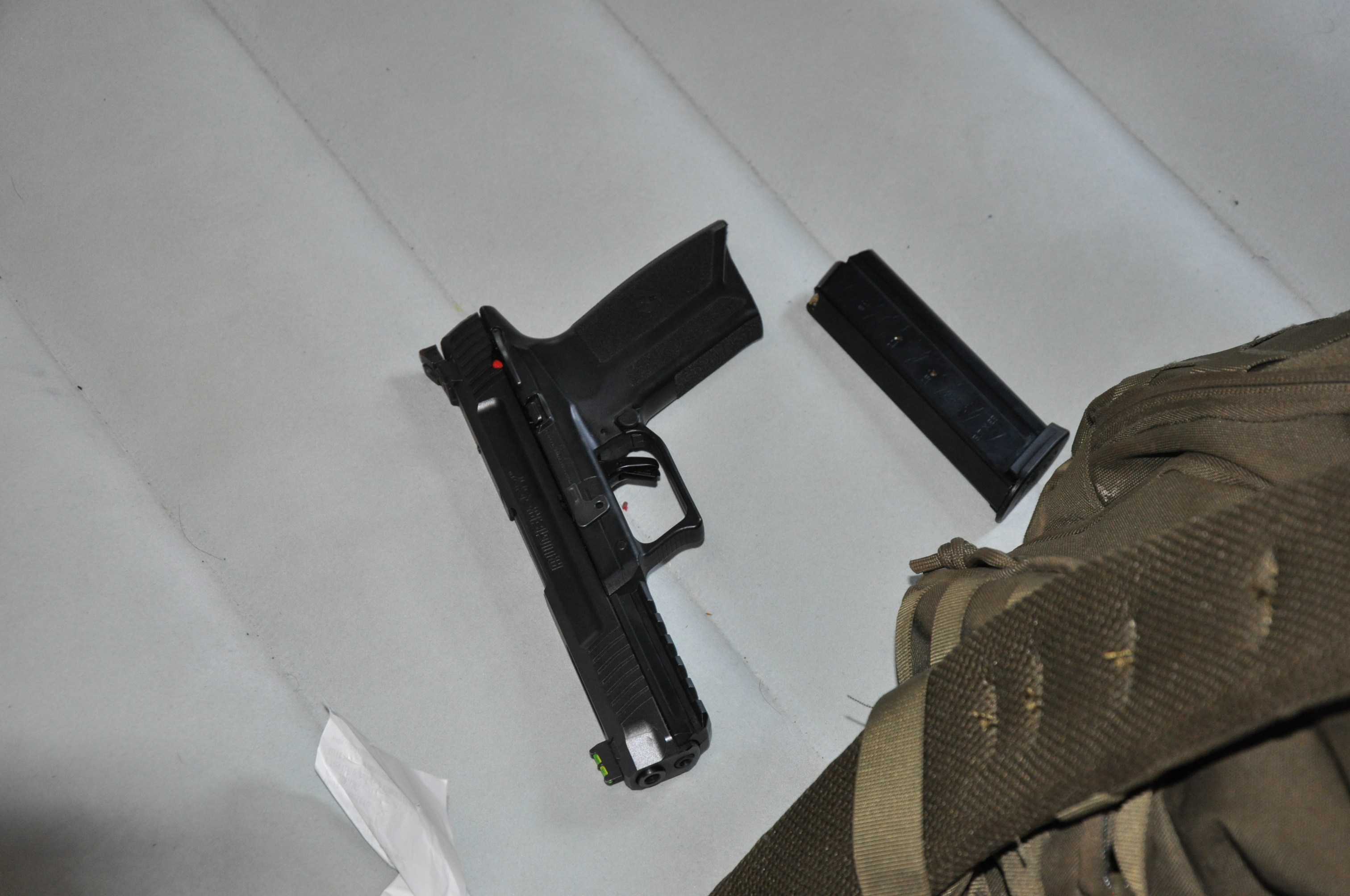 A firearm recovered by Yamhill County Sheriff's Office deputies at a Newberg property where authorities made a record illegal marijuana bust on Oct. 18, 2022. (Credit: Yamhill County Sheriff's Office)