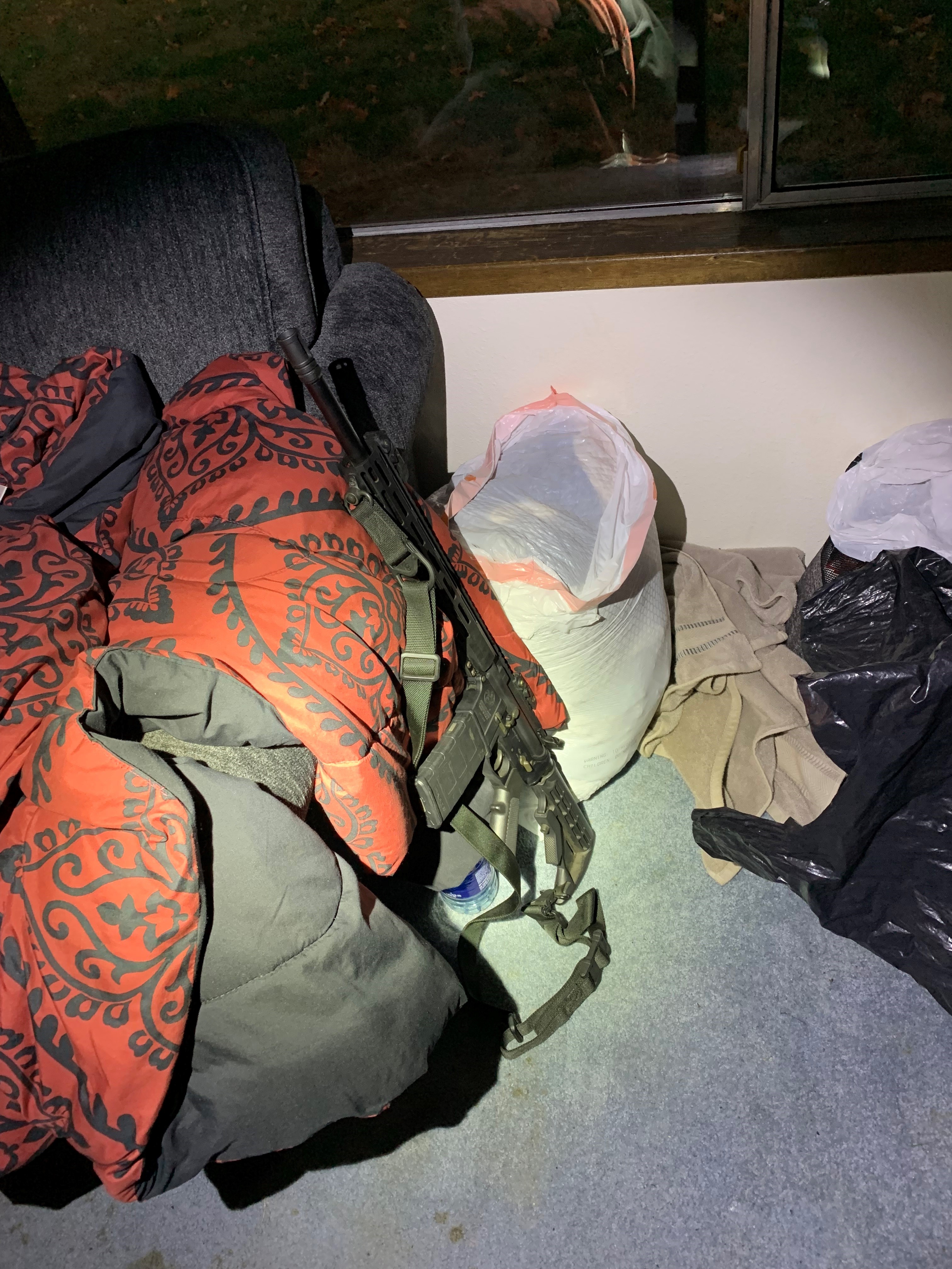 A firearm recovered by Yamhill County Sheriff's Office deputies at a Newberg property where authorities made a record illegal marijuana bust on Oct. 18, 2022. (Credit: Yamhill County Sheriff's Office)