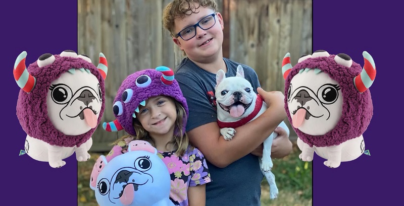 Kids hold a plushie of Bethanee Hamilton, a 3-legged French bulldog. Proceeds go to Joy Rx, part of the Children's Cancer Association, October 2022 (KOIN)