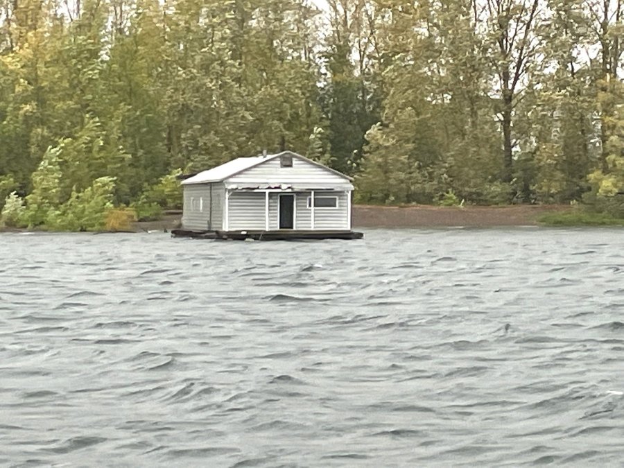 Multnomah County, OR storm propels Columbia River floating home to WA state