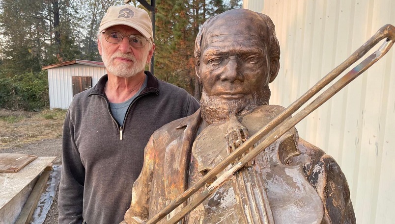 Sculptor Peter Helzer works on a statue of Louis Southworth, to be displayed in Louis Southworth Park in Waldport (City of Waldport)