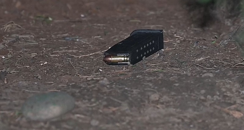 A loaded gun magazine is found on the ground near an officer-involved shooting in the Reedwood Friends Church parking lot in Southeast Portland, November 19, 2022 (KOIN)