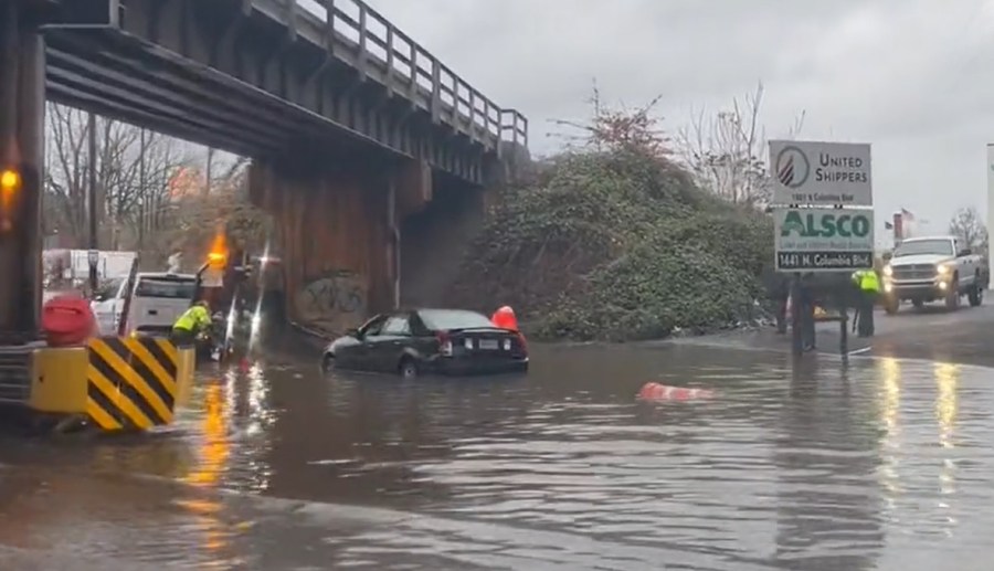 Cars were stuck on North Columbia Boulevard in Portland, Oregon on Tuesday, December 27, 2022 due to flooded roadways amid stormy conditions in the region