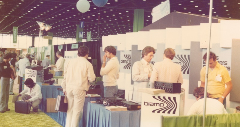 Biamp employees at a trade show, undated (Courtesy: Biamp)