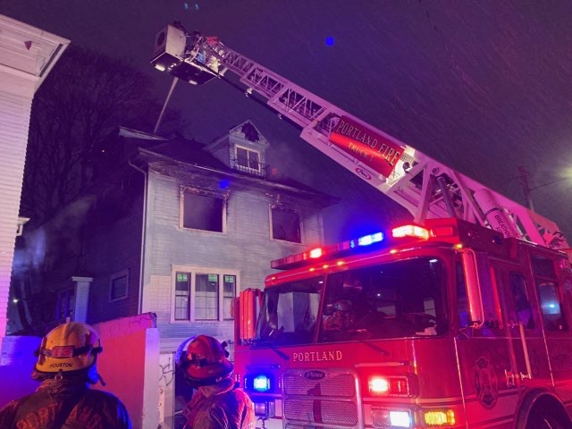 Firefighters battled a three-story house fire in Portland’s Pearl District neighborhood that ignited around midnight during challenging sub-freezing and windy conditions.