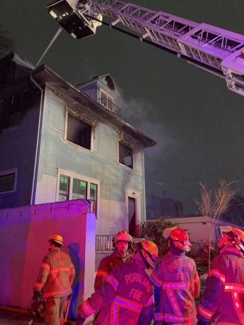 Firefighters battled a three-story house fire in Portland’s Pearl District neighborhood that ignited around midnight during challenging sub-freezing and windy conditions.